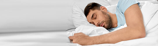 Man sleeping on a pillow